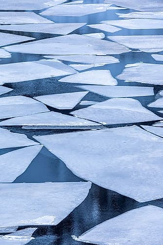 Norway- Lofoten Islands. Broken ice on Lake Storvatent Art Print